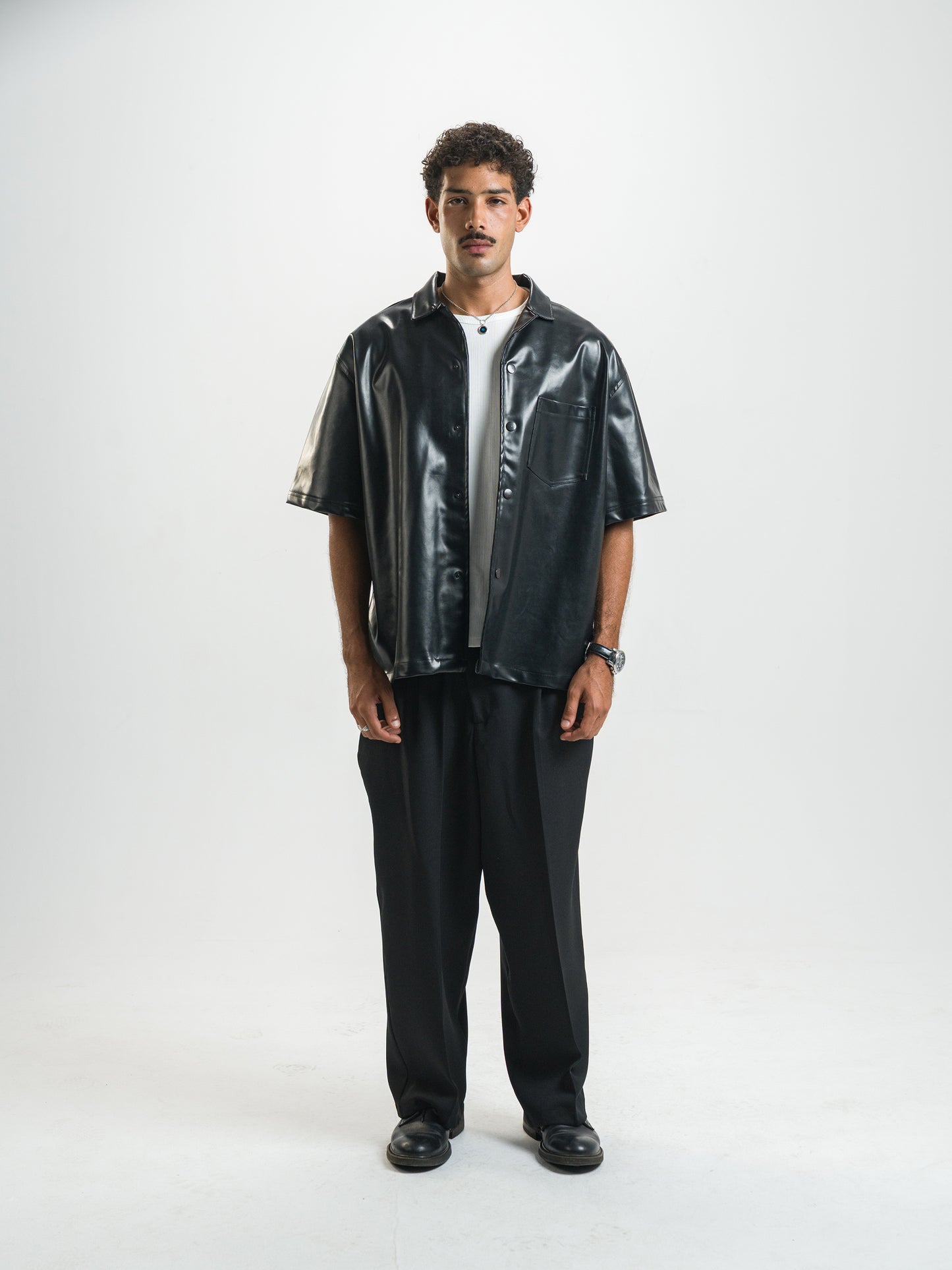 Over Sate Black Leather