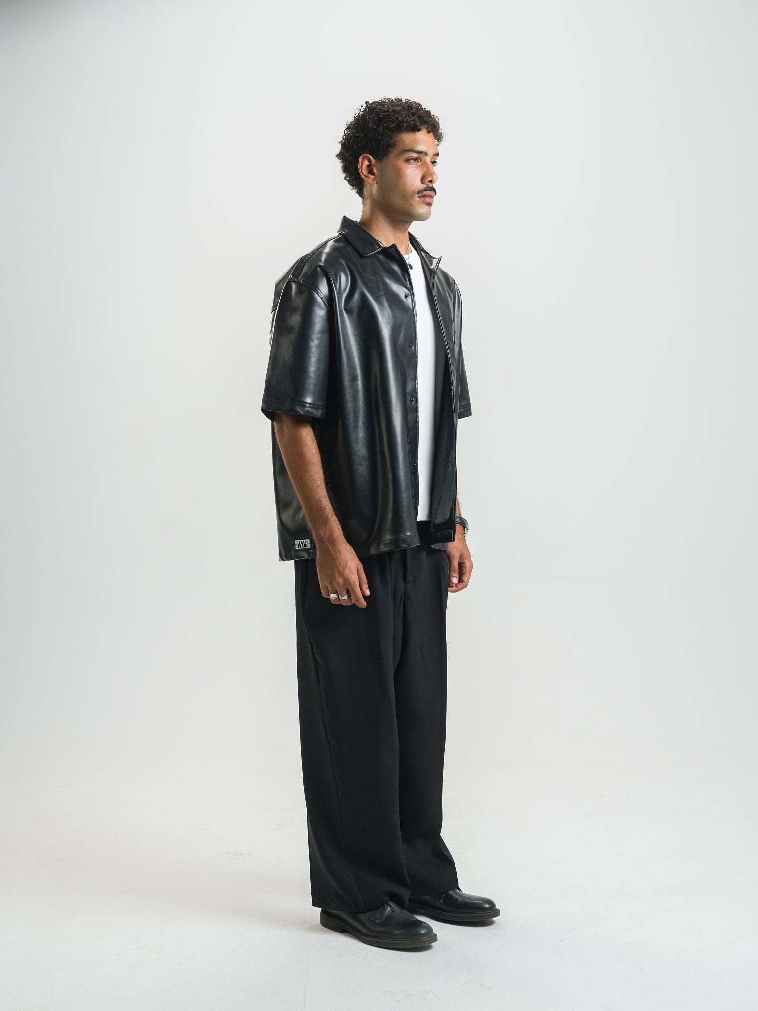 Over Sate Black Leather