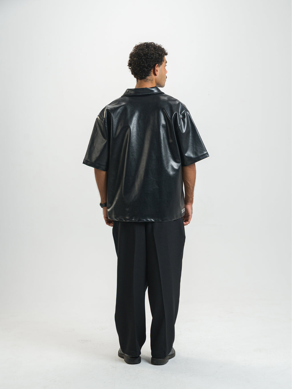Over Sate Black Leather