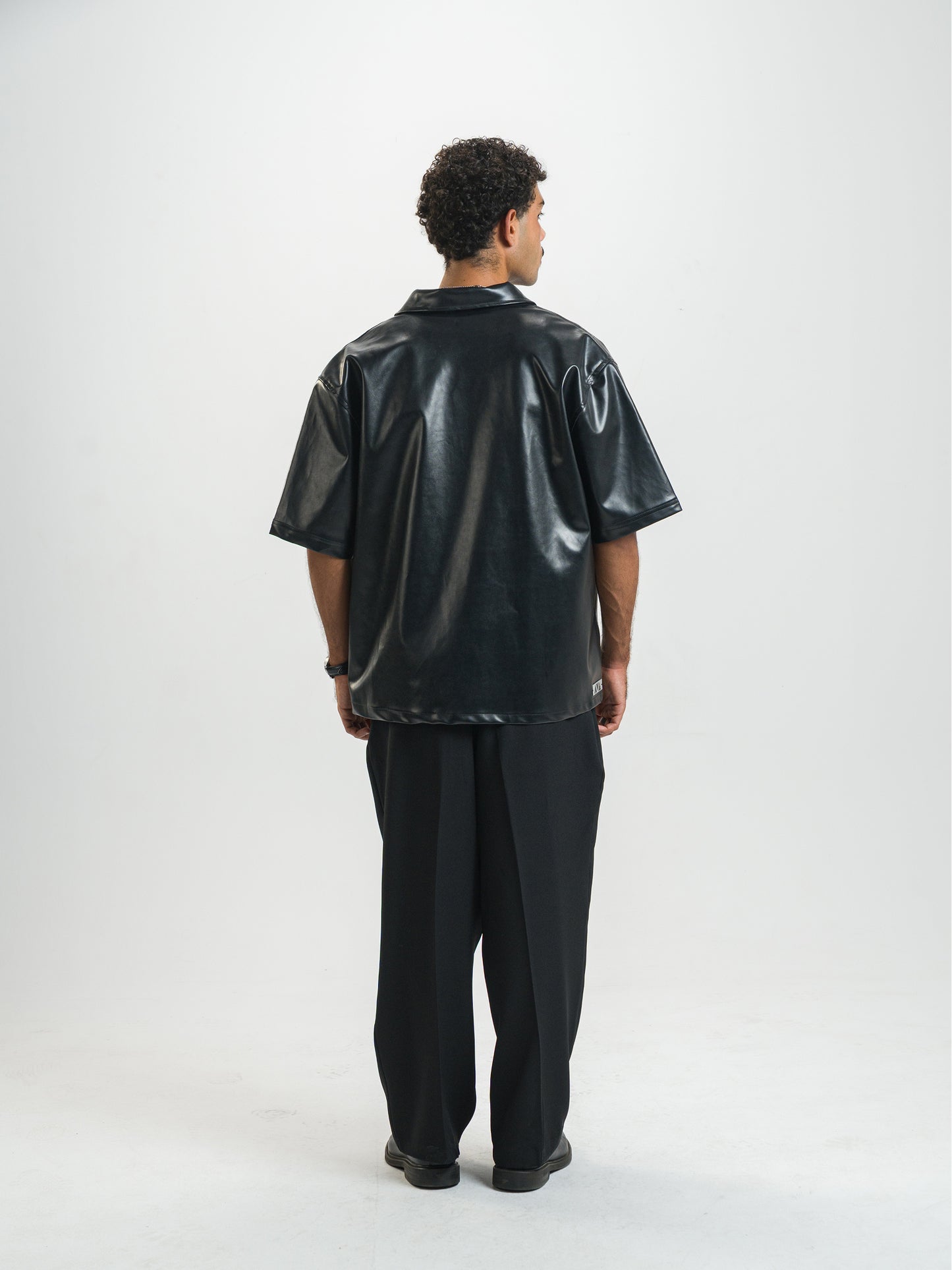 Over Sate Black Leather